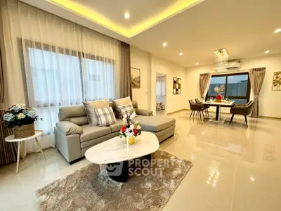 Luxurious modern living room with elegant decor and spacious dining area