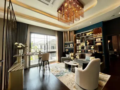 Luxurious living room with elegant chandelier and modern decor