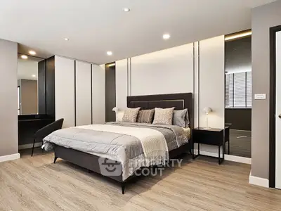Luxurious modern bedroom with elegant decor and spacious layout