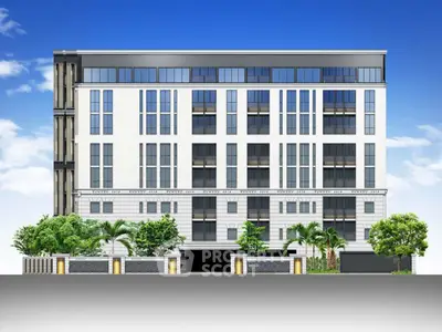 Modern luxury apartment building with sleek design and lush landscaping.