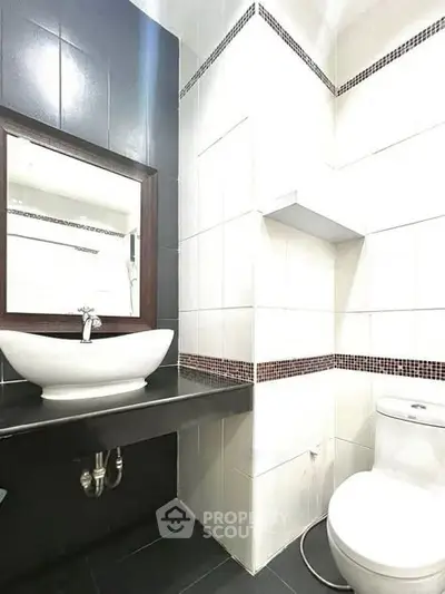 Modern bathroom with sleek design and stylish fixtures.