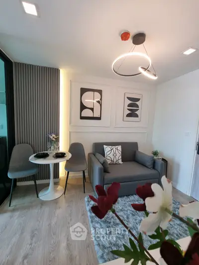 Modern living room with stylish decor and cozy seating area