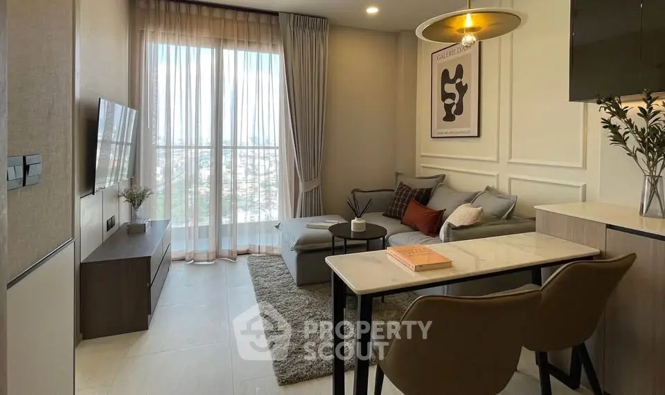 Modern living room with stylish decor and large window view
