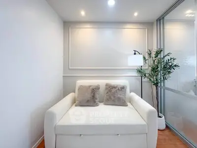 Cozy modern living room with white sofa and stylish decor