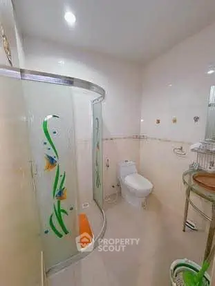 Modern bathroom with glass shower and stylish decor