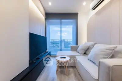 Modern living room with sleek design and city view from balcony
