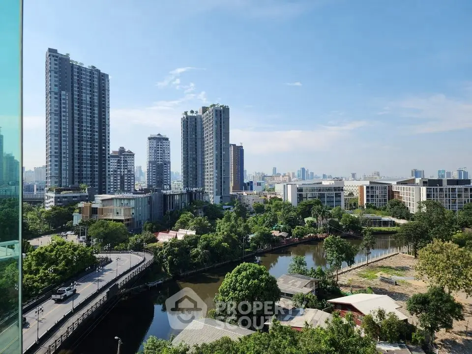 Stunning cityscape view with high-rise buildings and lush greenery, perfect for urban living.