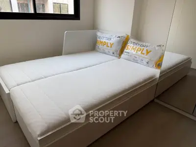 Modern bedroom with minimalist design and mirrored wardrobe