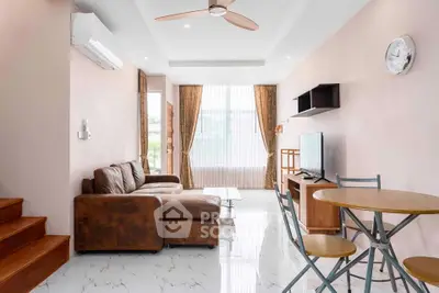 Modern living room with stylish furniture and natural light