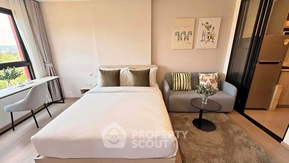 Modern studio apartment with cozy bedroom and stylish decor