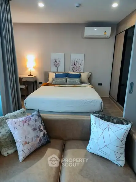 Modern bedroom with stylish decor and cozy ambiance