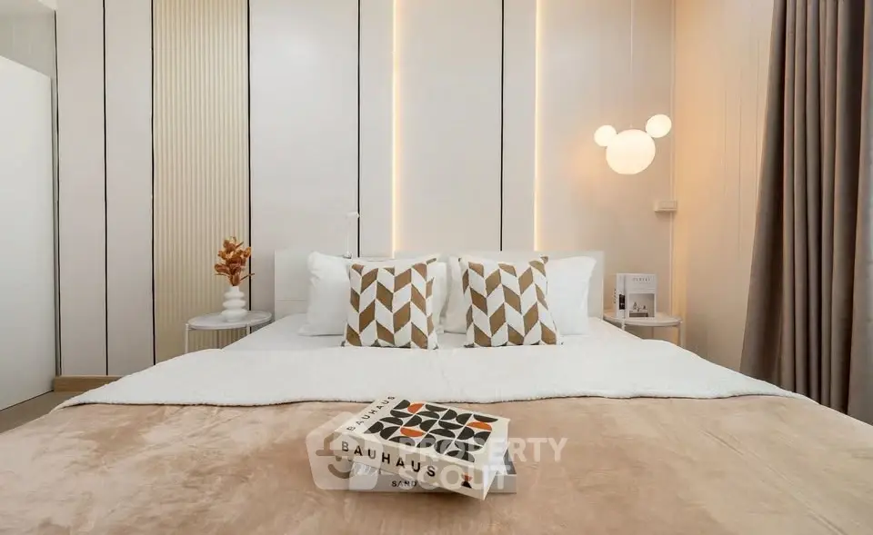 Stylish modern bedroom with geometric decor and cozy lighting