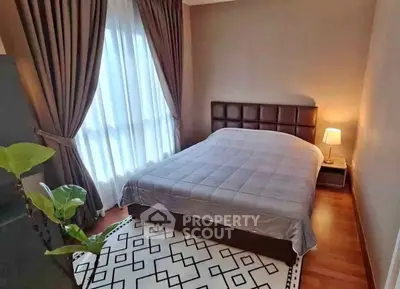 Cozy bedroom with elegant decor and natural light