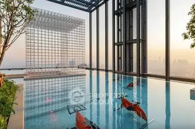 Luxurious rooftop pool with stunning city views and modern architectural design.