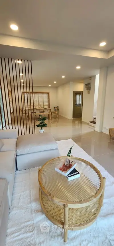 Spacious modern living room with elegant decor and open layout