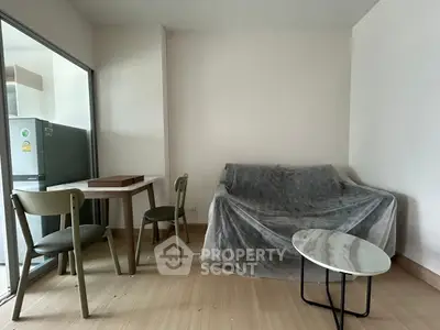 Modern living room with minimalist furniture and natural light