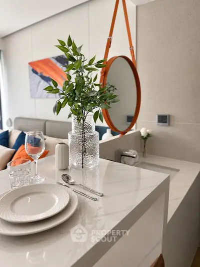 Modern living room with stylish decor and elegant dining setup