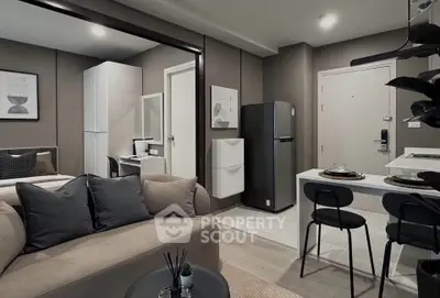 Modern studio apartment with open layout, featuring cozy living area and sleek kitchen design.