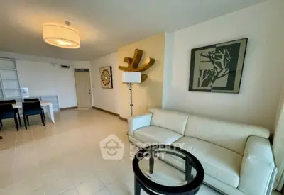 Spacious modern living room with elegant decor and ample natural light