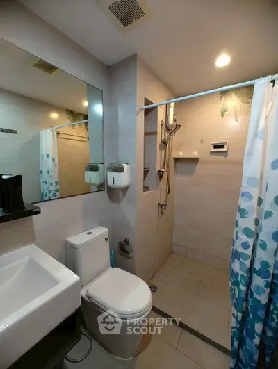 Modern bathroom with walk-in shower and sleek fixtures