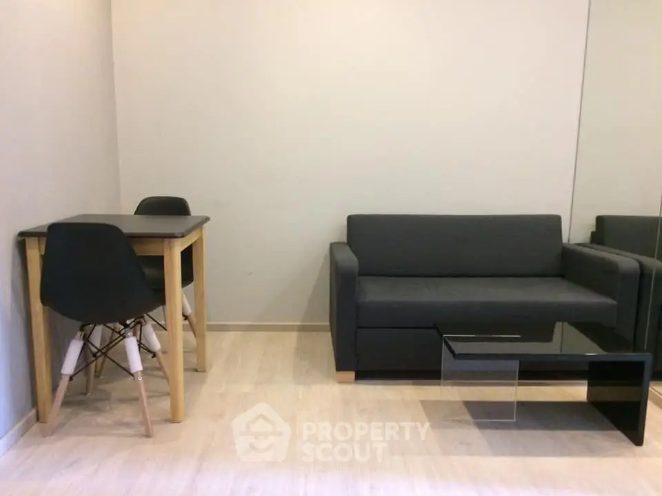 Modern minimalist living room with sleek furniture and neutral tones