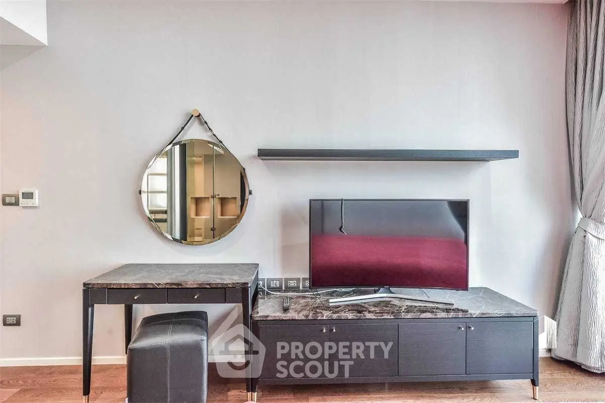 Modern living room with stylish TV unit and elegant decor