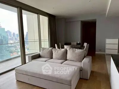 Modern living room with city view and spacious balcony in luxury apartment