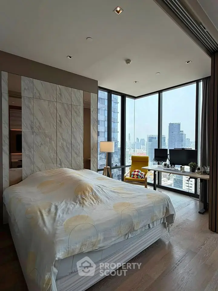 Luxurious bedroom with stunning city view and modern decor