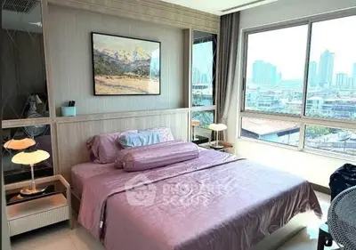 Luxurious bedroom with city view and elegant decor