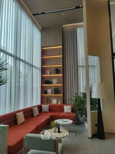 Luxurious modern living room with high ceilings and elegant decor