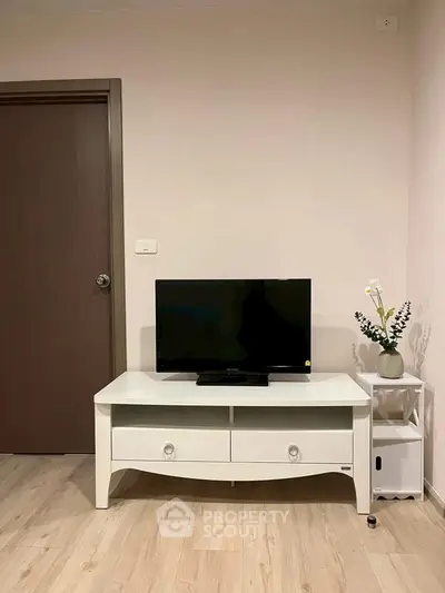 Modern living room with sleek TV stand and minimalist decor