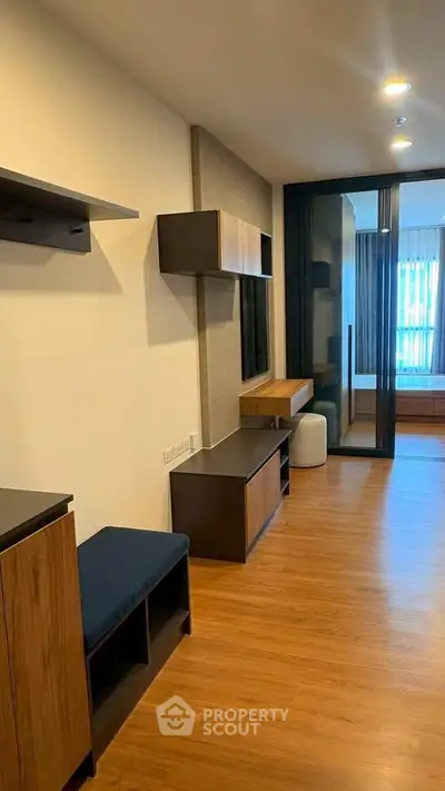 Modern apartment interior with wooden flooring and stylish furniture