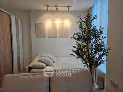 Cozy bedroom with modern decor and natural light
