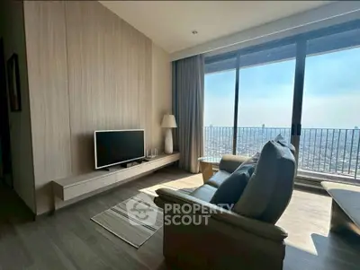 Modern living room with stunning city view and sleek furniture