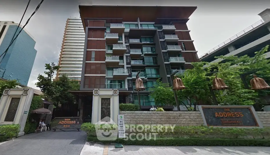 Modern urban condominium with lush greenery and stylish architecture