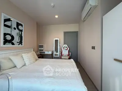 Modern bedroom with stylish decor and comfortable bedding