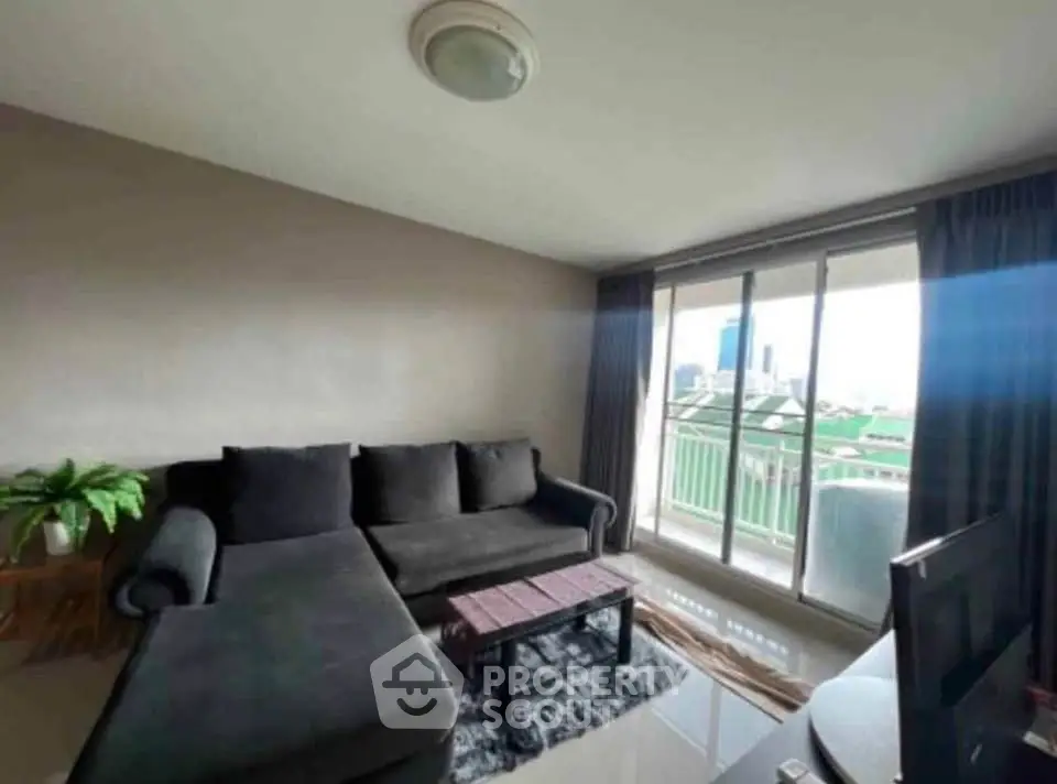 Spacious living room with modern sofa and balcony view