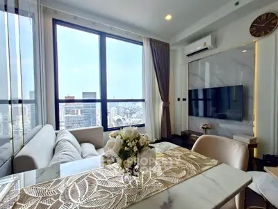 Luxurious living room with stunning city view, elegant decor, and modern furnishings.