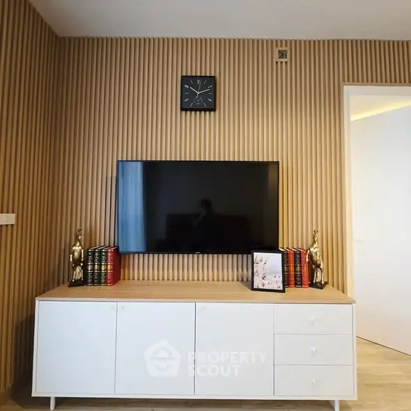 Stylish living room with modern TV setup and elegant decor