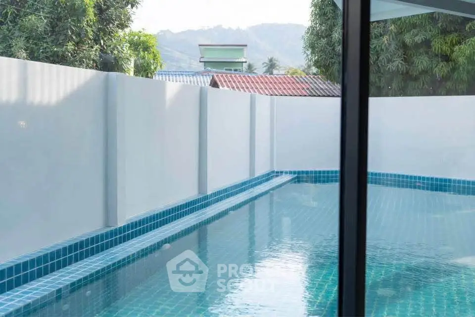 Luxurious private pool with serene surroundings and modern design