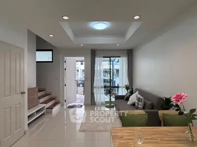 Spacious modern living room with elegant decor and natural light