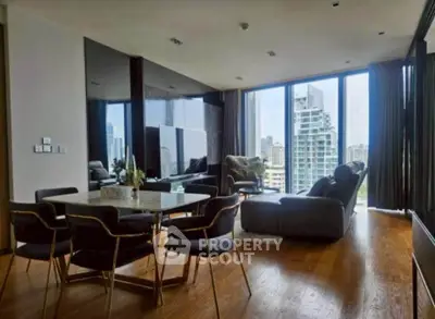 Luxurious living room with stunning city view and modern furnishings