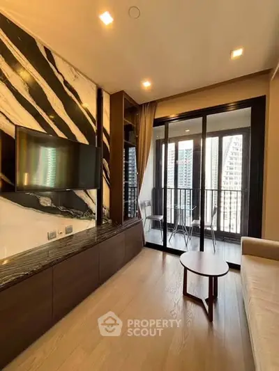 Modern living room with balcony view in high-rise apartment