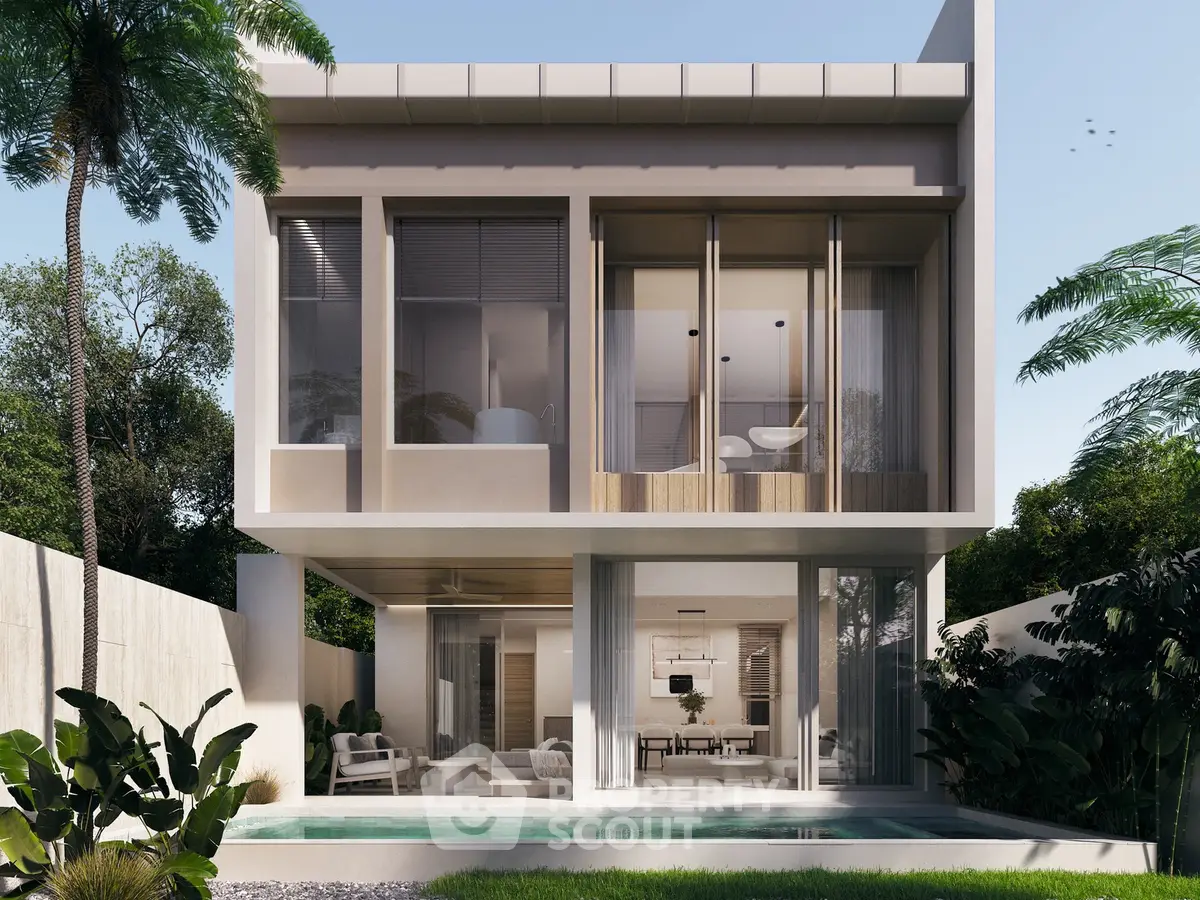 Modern luxury villa with large windows and private pool surrounded by lush greenery.