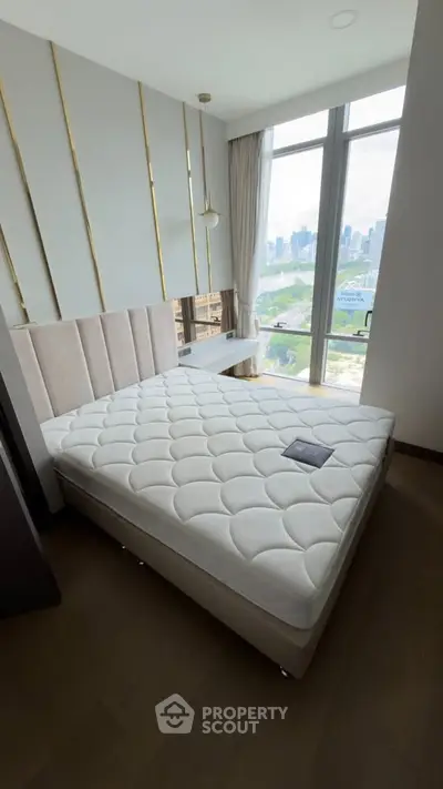 Luxurious bedroom with stunning city view and elegant decor