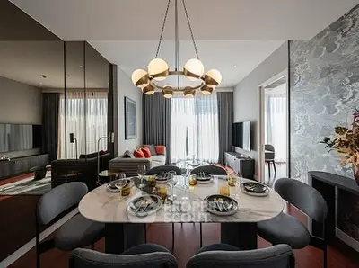 Luxurious modern living room with elegant dining area and stylish decor.