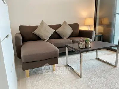 Modern living room with cozy brown sofa and stylish coffee table, perfect for relaxation and entertaining.