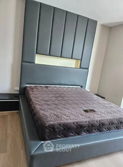 Luxurious bedroom with modern bed and stylish headboard design