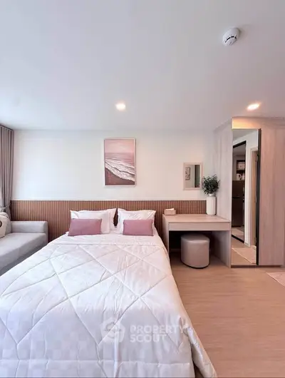 Modern bedroom with cozy decor and stylish furnishings, featuring a comfortable bed and elegant design.