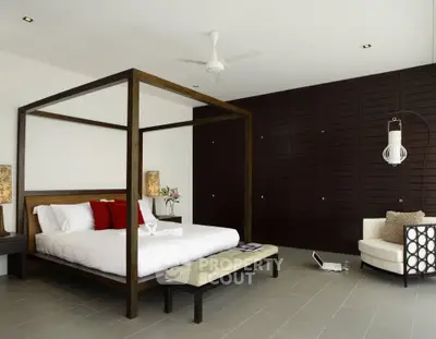 Luxurious modern bedroom with elegant four-poster bed and stylish decor